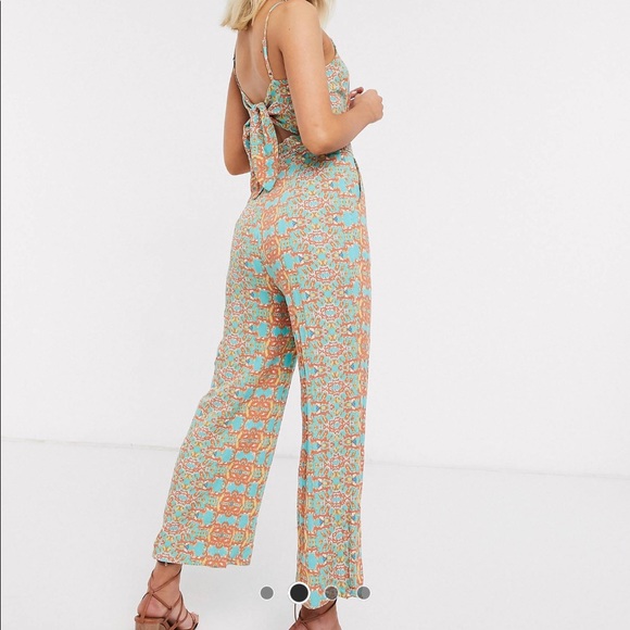 Moon River Cut Out Strappy Jumpsuit - Picture 1 of 10